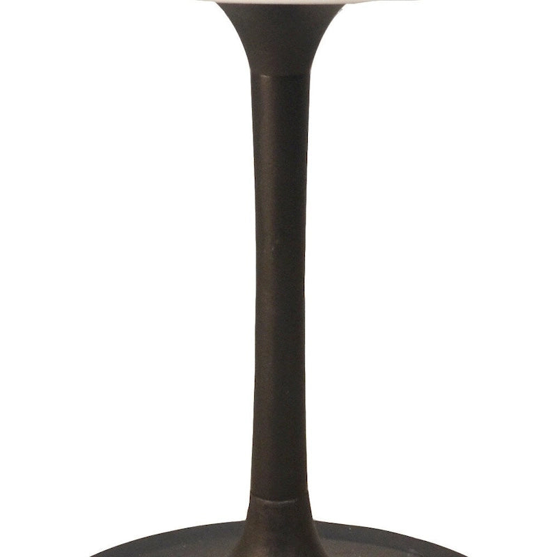 Table à manger ronde plateau marbre blanc piétement fer noir style moderne