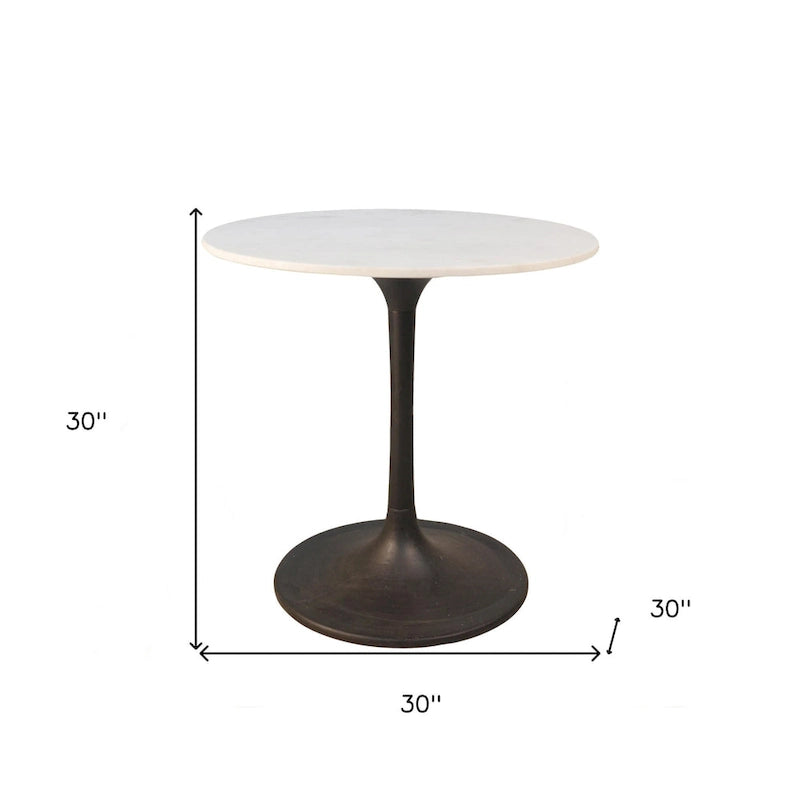 Table à manger ronde plateau marbre blanc piétement fer noir style moderne