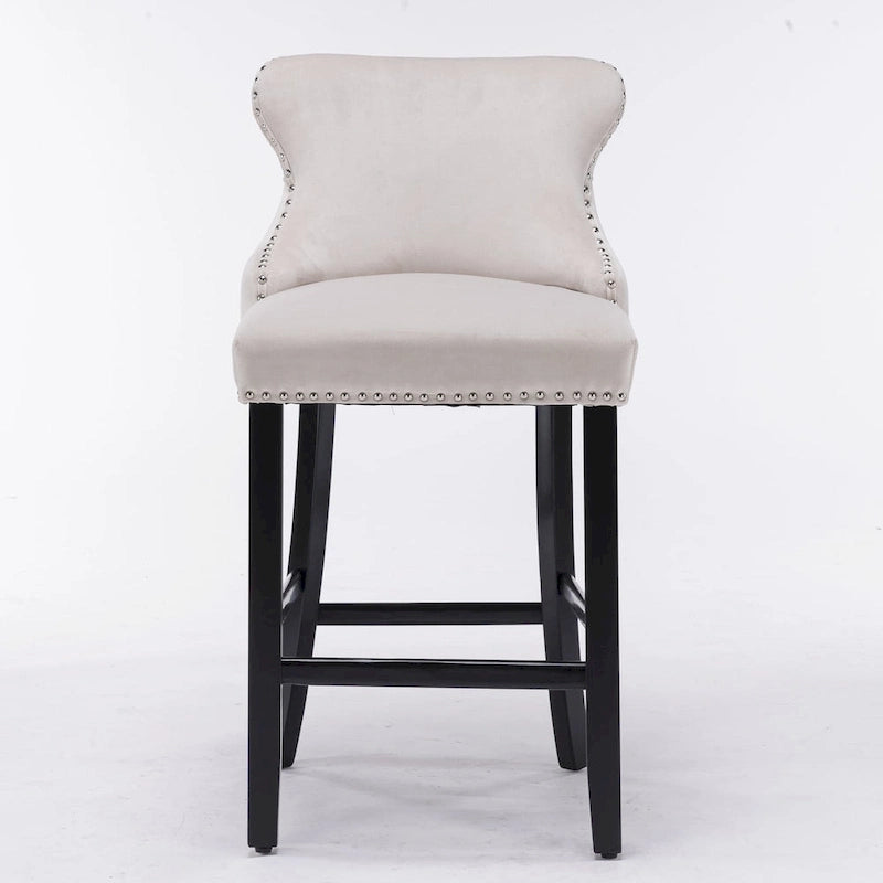 Tabouret de bar à dossier ailé capitonné en velours avec garniture cloutée