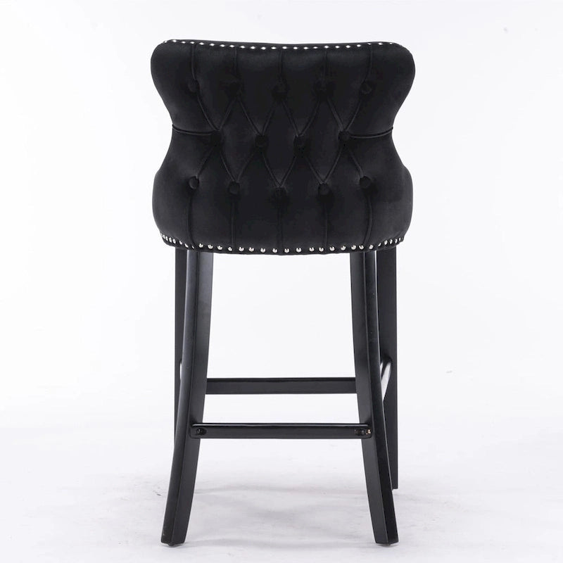 Tabouret de bar à dossier ailé capitonné en velours avec garniture cloutée