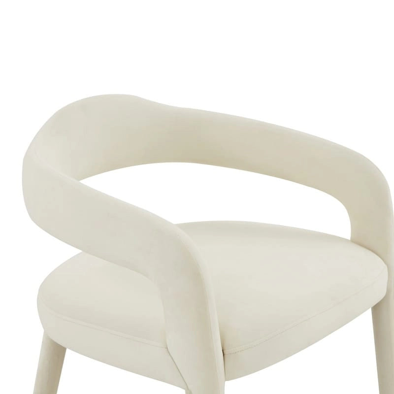 Chaise de salle à manger en velours avec dossier incurvé ouvert et pieds à embouts dorés