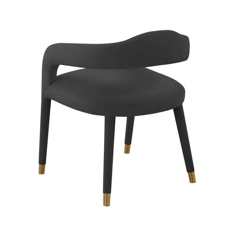 Chaise de salle à manger en velours avec dossier incurvé ouvert et pieds à embouts dorés